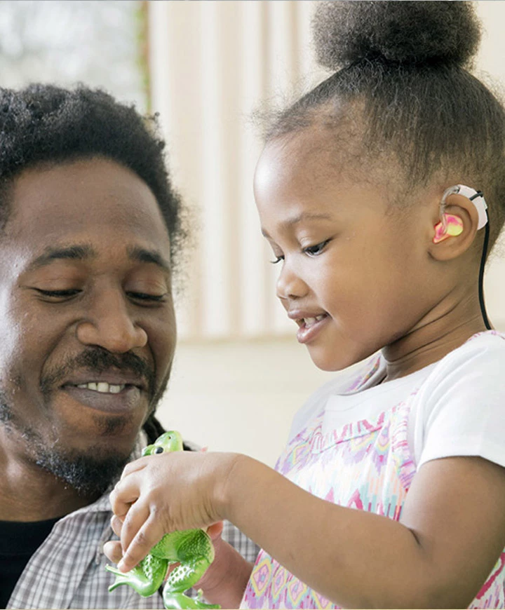 father and daughter playing